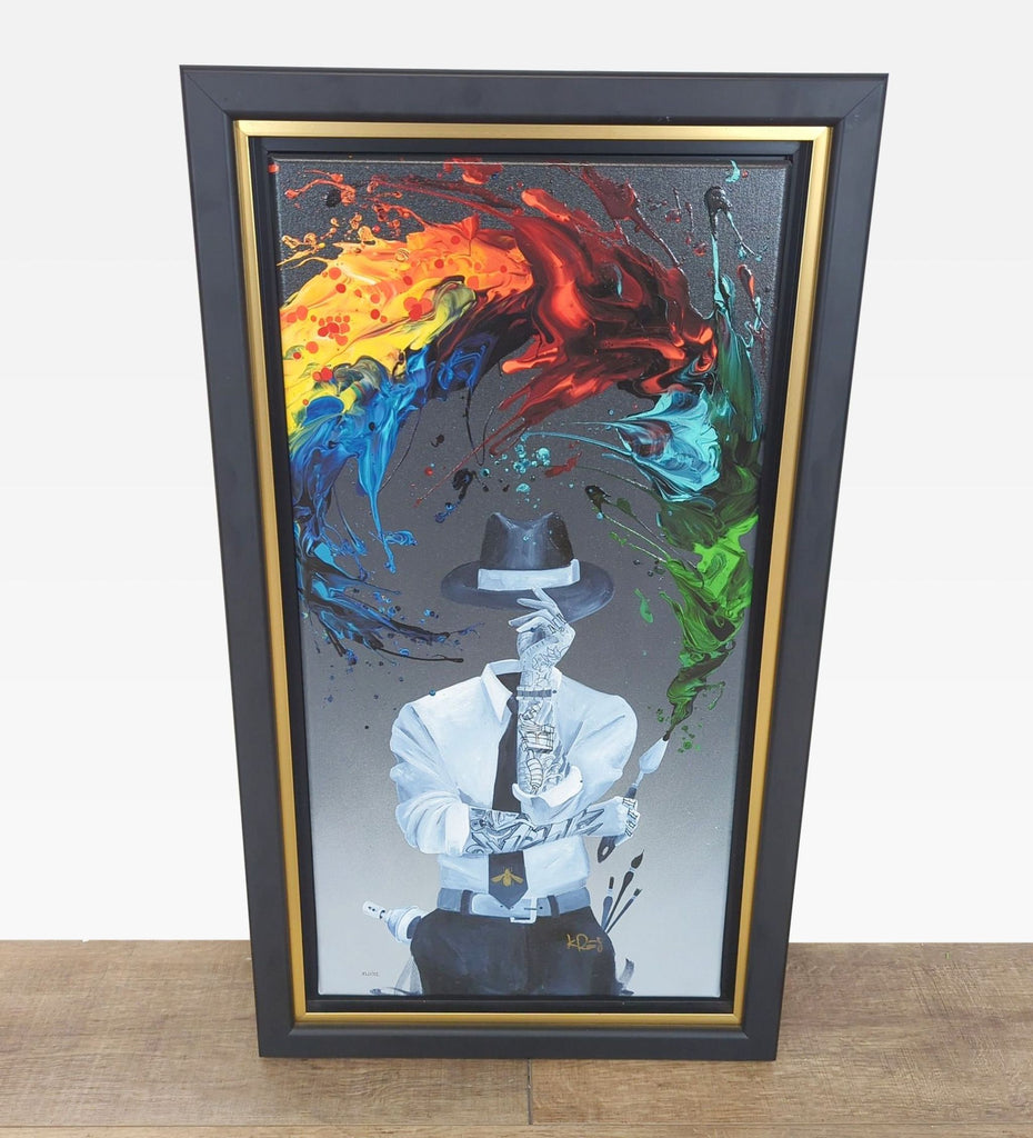 1. Framed giclee print by Kevin Kre8 of a faceless figure with vibrant splash colors, signed by the artist.