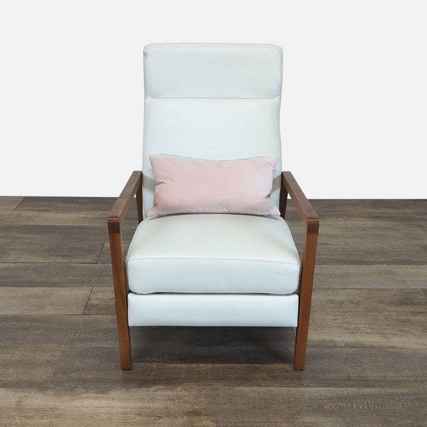 Front view of a Reperch Scandinavian-inspired lounge chair with white leather upholstery and wood arms.  