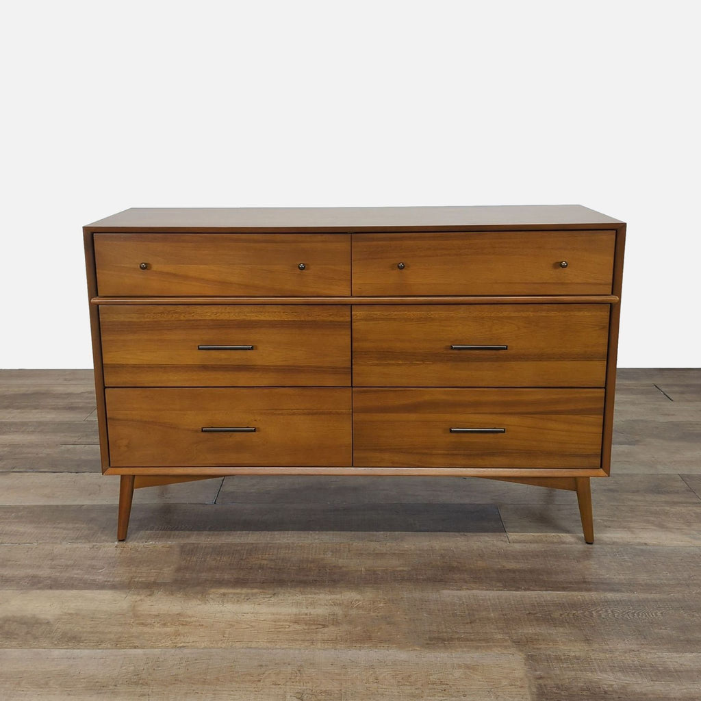 1. West Elm dresser made from kiln-dried, sustainably sourced wood, shown closed on a wood floor.