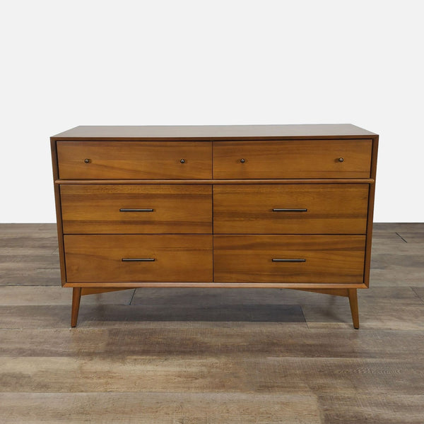1. West Elm dresser made from kiln-dried, sustainably sourced wood, shown closed on a wood floor.