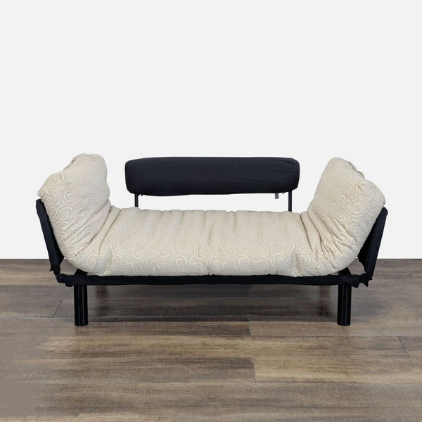 1. Innovation brand convertible sofa with sides folded down, showing a custom firm mattress in beige fabric.