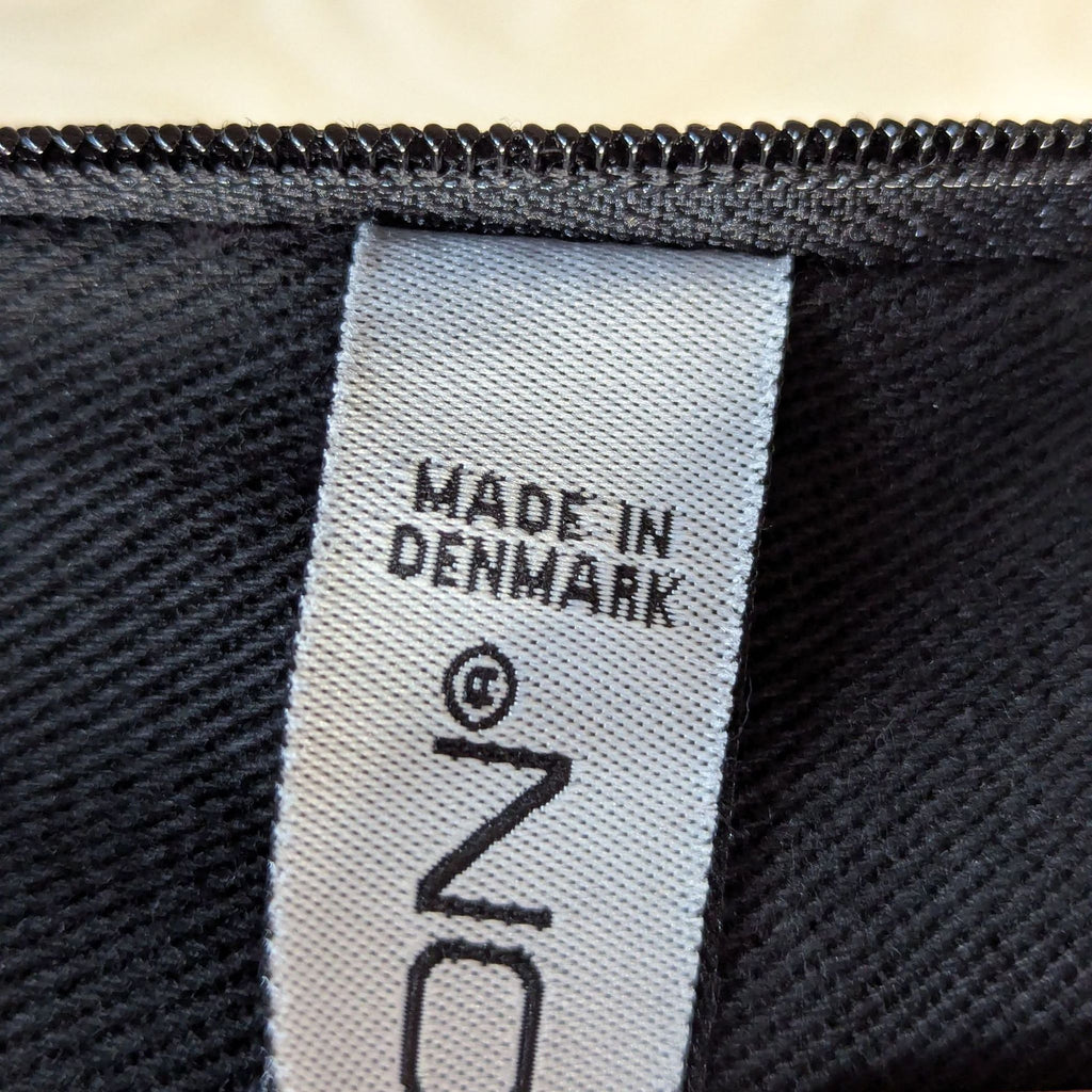 Innovation Convertible Sofa with Adjustable Armrests and Black Frame