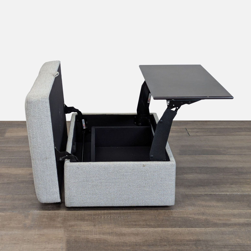 3. Side view of Pottery Barn ottoman with raised lift-top tray and open storage compartment.