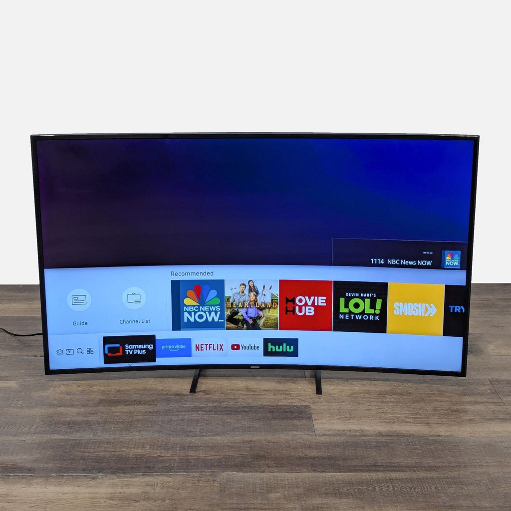2. Samsung 55-inch curved Smart TV displaying streaming apps like Netflix, Hulu, and YouTube on the home screen.