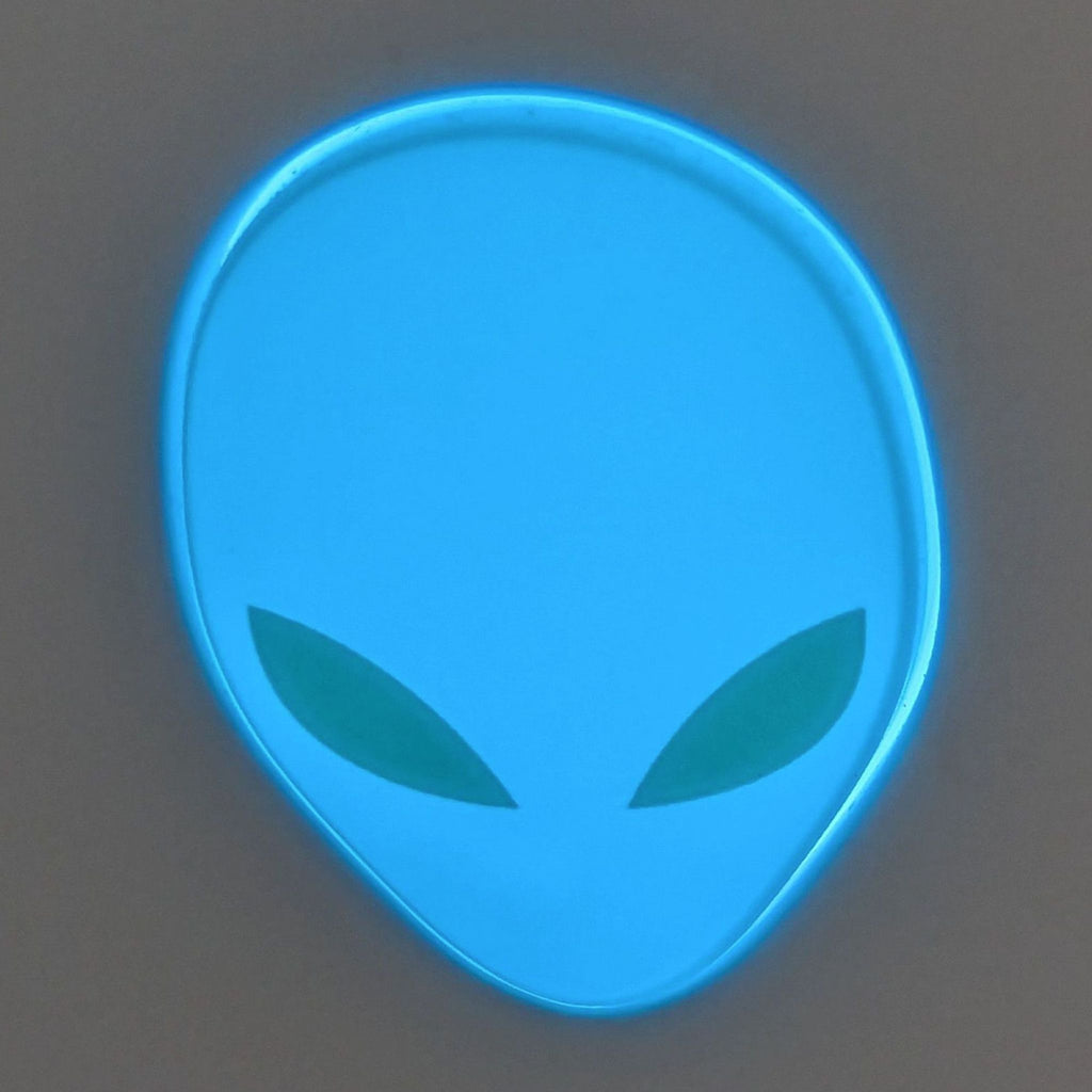 3. Closeup of the iconic glowing blue Alienware alien head logo featured on the monitor's back panel.