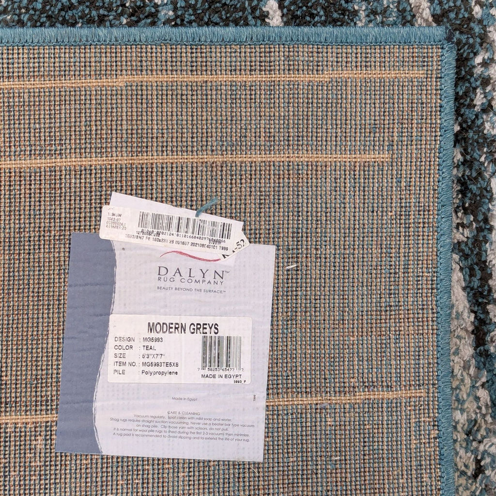 3. Rug back corner with Dalyn brand label, showing product details and care instructions for the polypropylene rug.