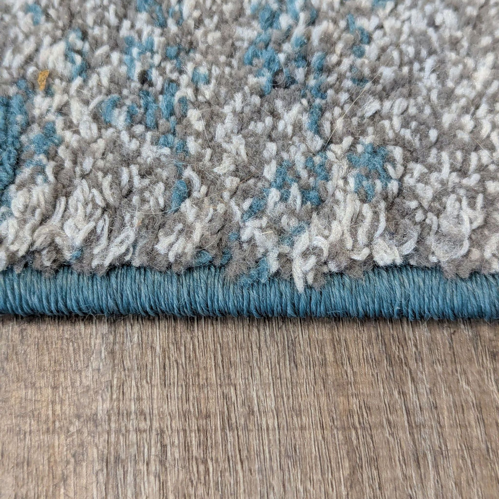 3. Detailed edge view of Dalyn polypropylene rug, highlighting bound edge and plush 1/2” pile texture.