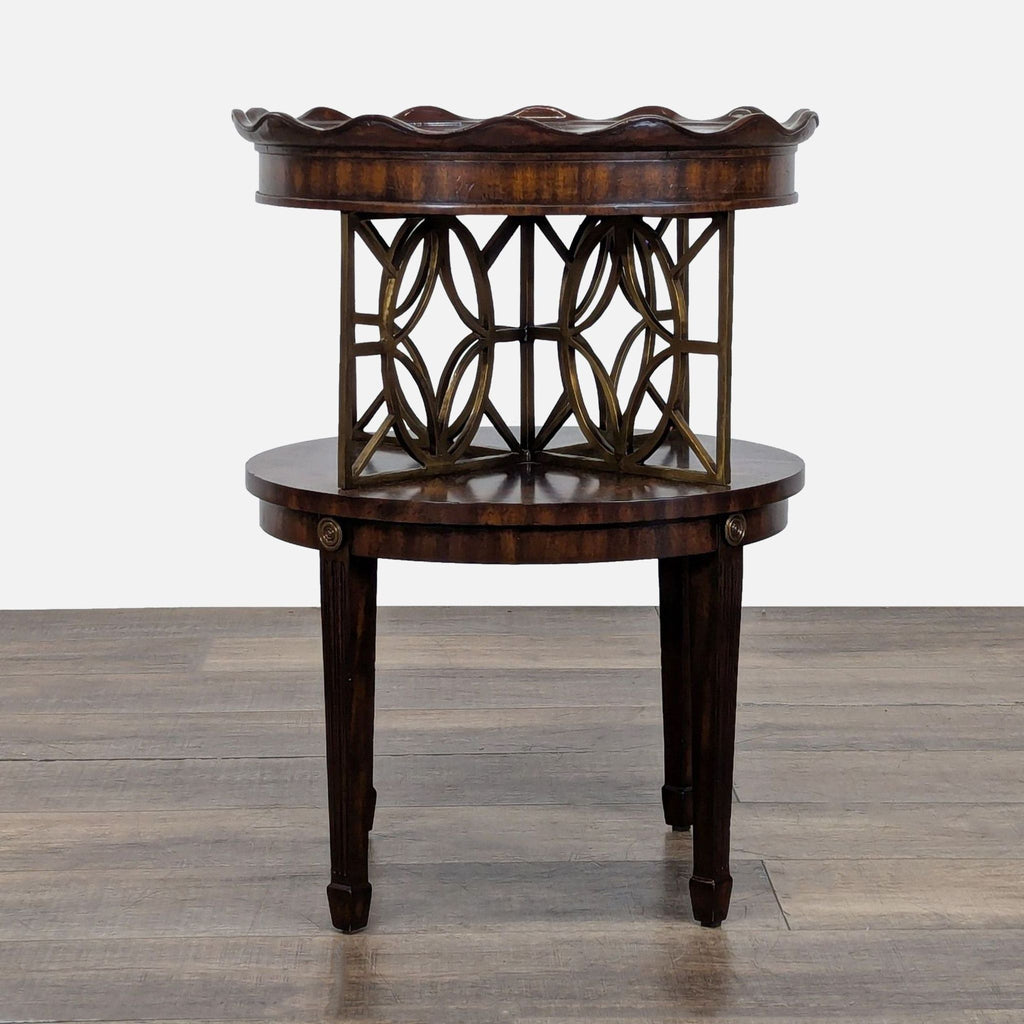 2. Round console table featuring two tiers of burlwood, decorative brass center, and elegant fluted legs by Maitland-Smith.  
