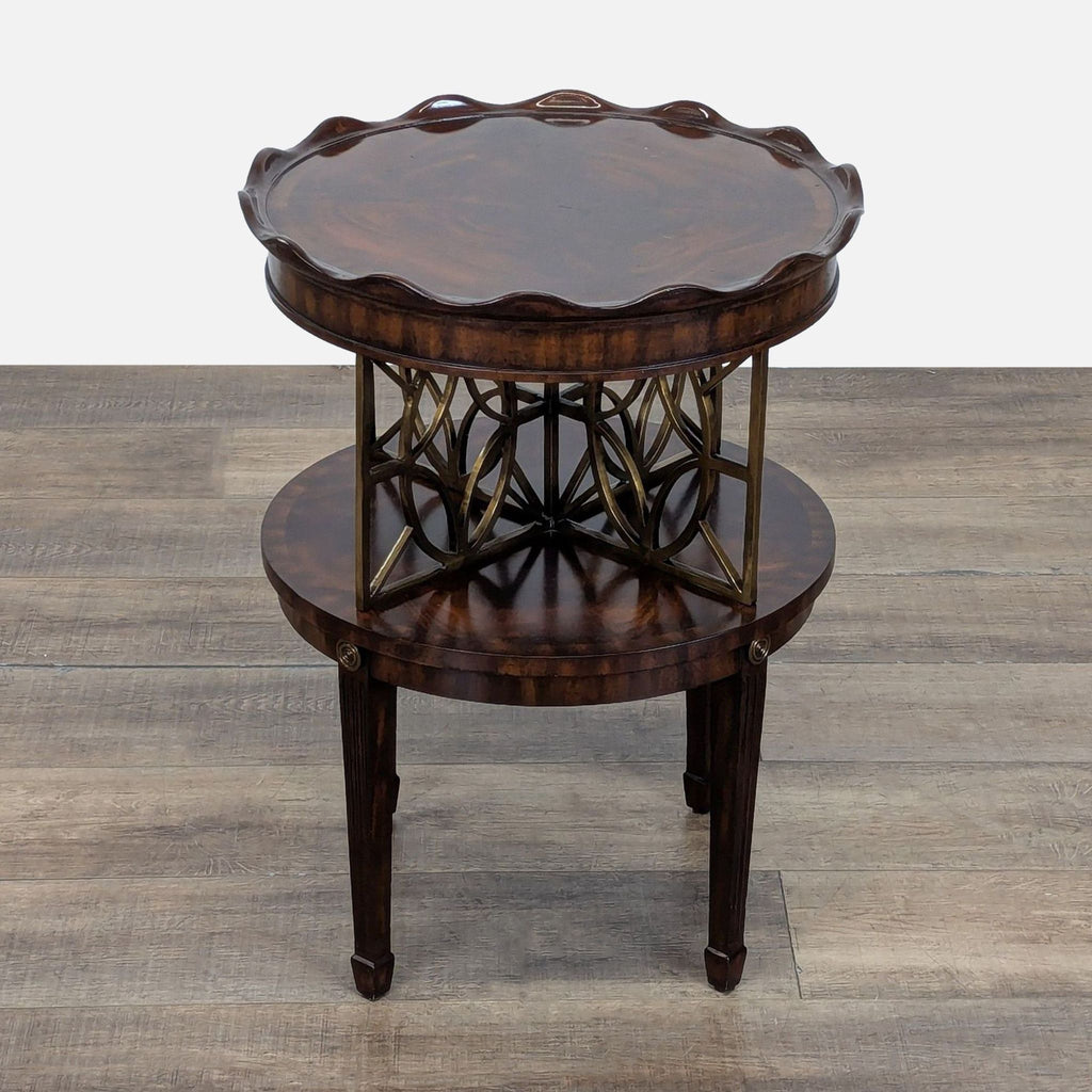 3. Elegant Maitland-Smith side table with scalloped top, brass geometric center, and lower tier supported by fluted legs.