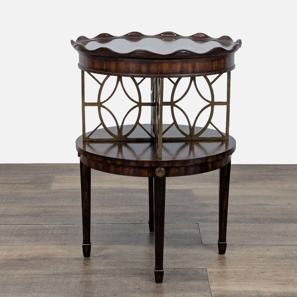1. Maitland-Smith side table with inlaid burlwood top, piecrust edge, brass accents, and fluted legs with medallions.  
