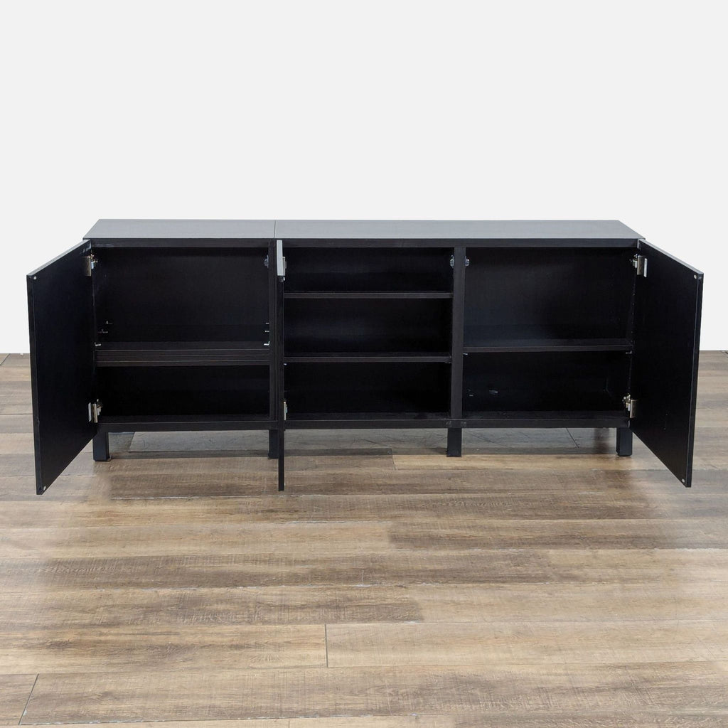 2. Ikea credenza in black with open cabinet doors, revealing multiple interior shelves for storage organization.