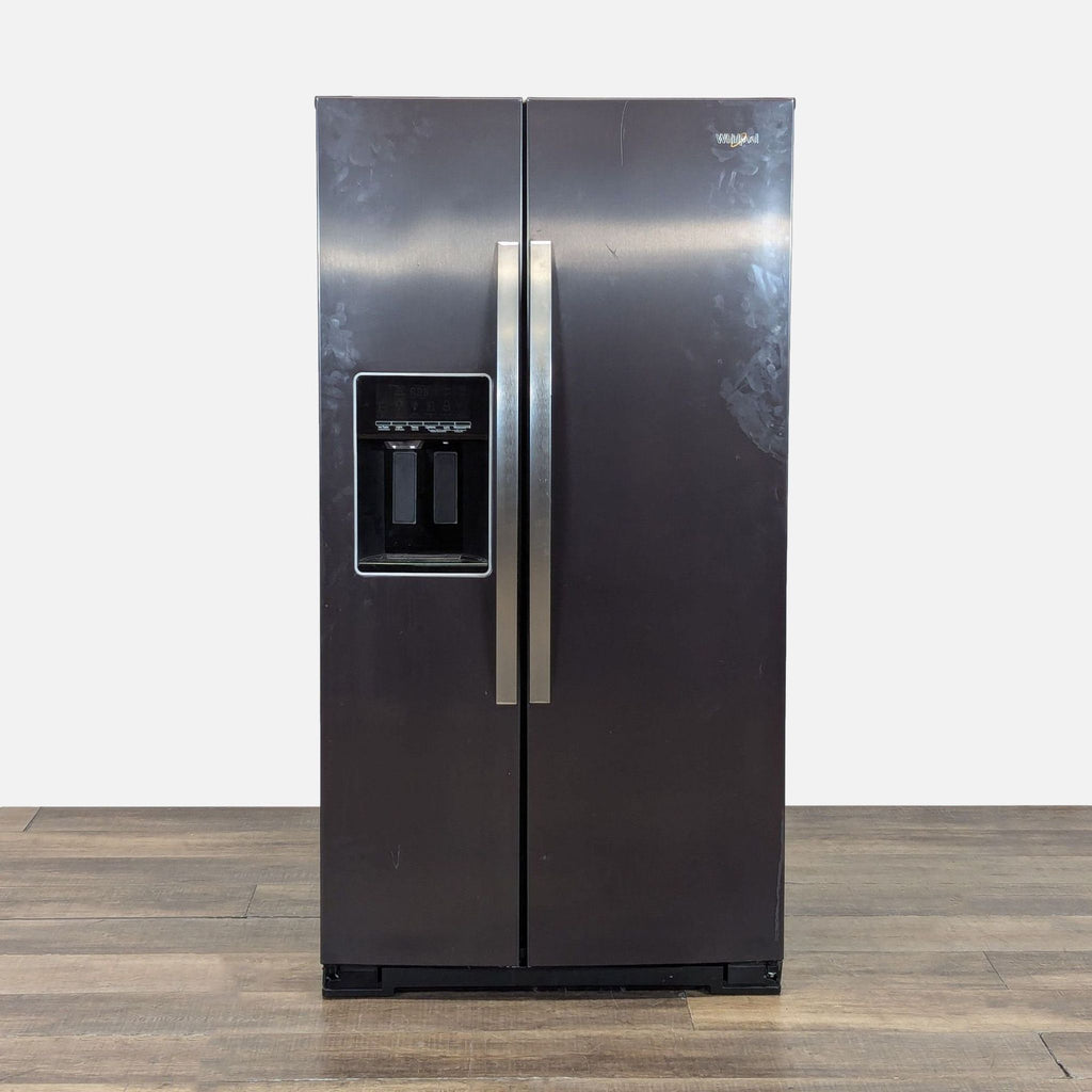 1. Whirlpool side-by-side refrigerator in fingerprint-resistant black stainless steel with external ice and water dispenser.