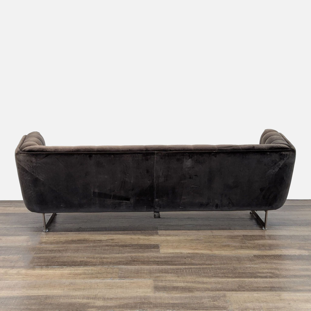 3. Back view of Sunpan 3-seat velvet sofa featuring plush upholstery and modern metal base.