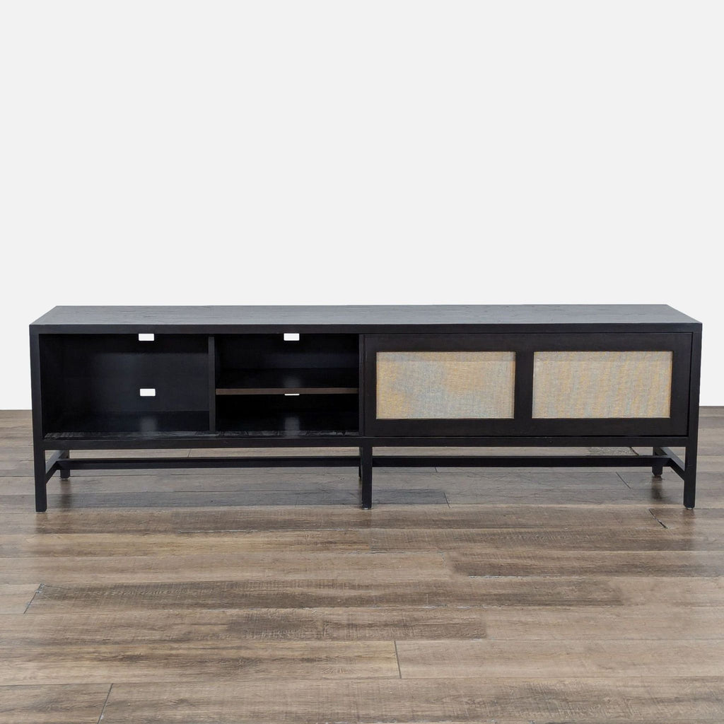 2. Entertainment center by Room & Board, showing partially open woven panels revealing interior shelving.