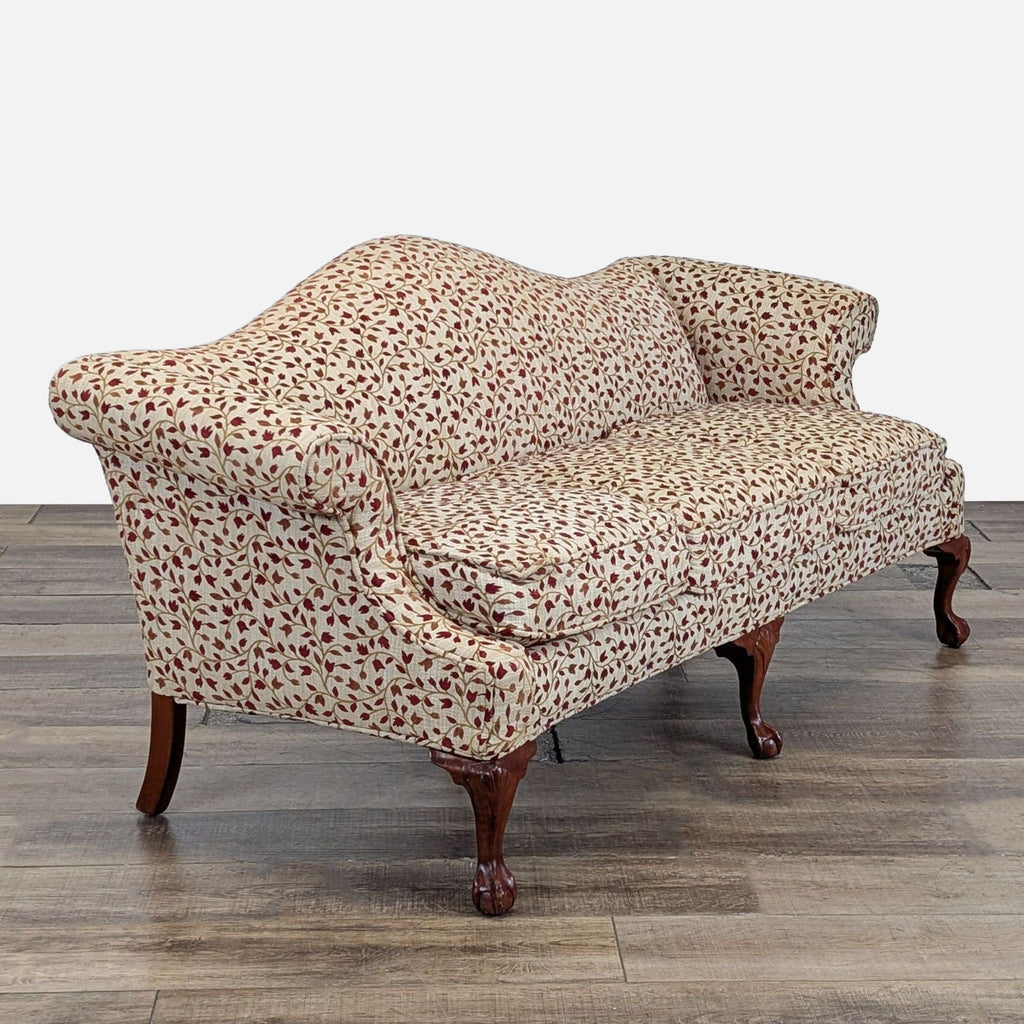 Camelback Sofa With Floral Upholstery