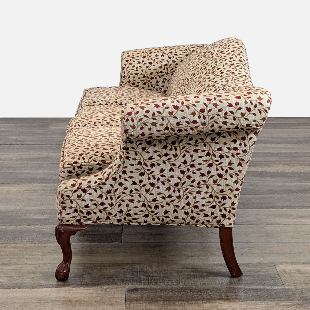 Camelback Sofa With Floral Upholstery