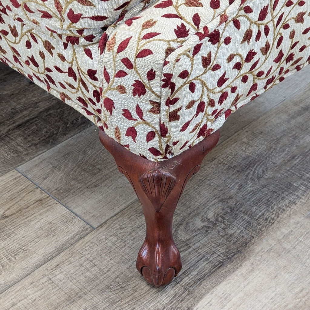 Camelback Sofa With Floral Upholstery