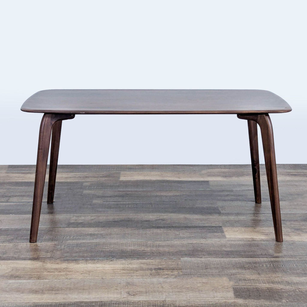 1. Castlery dining table with rounded corners and dark wood finish, shown on a wooden floor, front view.  