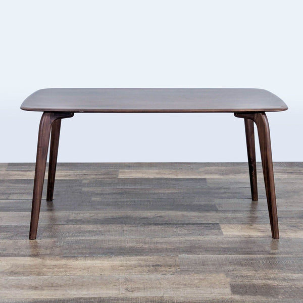 1. Castlery dining table with rounded corners and dark wood finish, shown on a wooden floor, front view.  