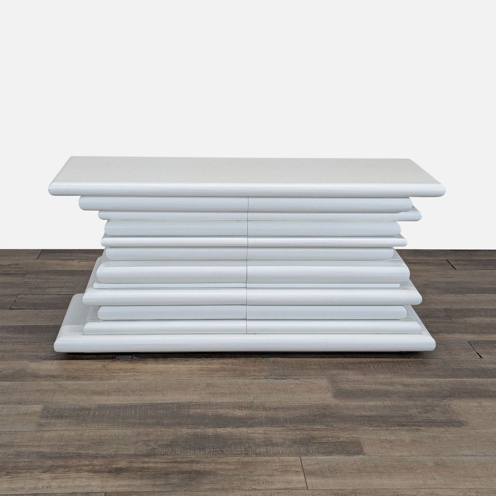 1. Reperch dresser with a white, stacked, rounded design featuring six horizontal drawers, front view.