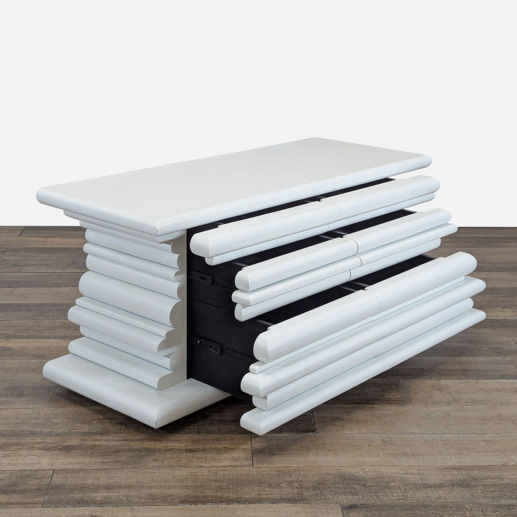 2. Angled view of Reperch dresser showing partially opened six drawers and unique rounded horizontal elements.