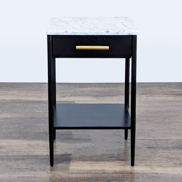 1. Black hot rolled steel side table by West Elm with a marble top and brass drawer handle.
