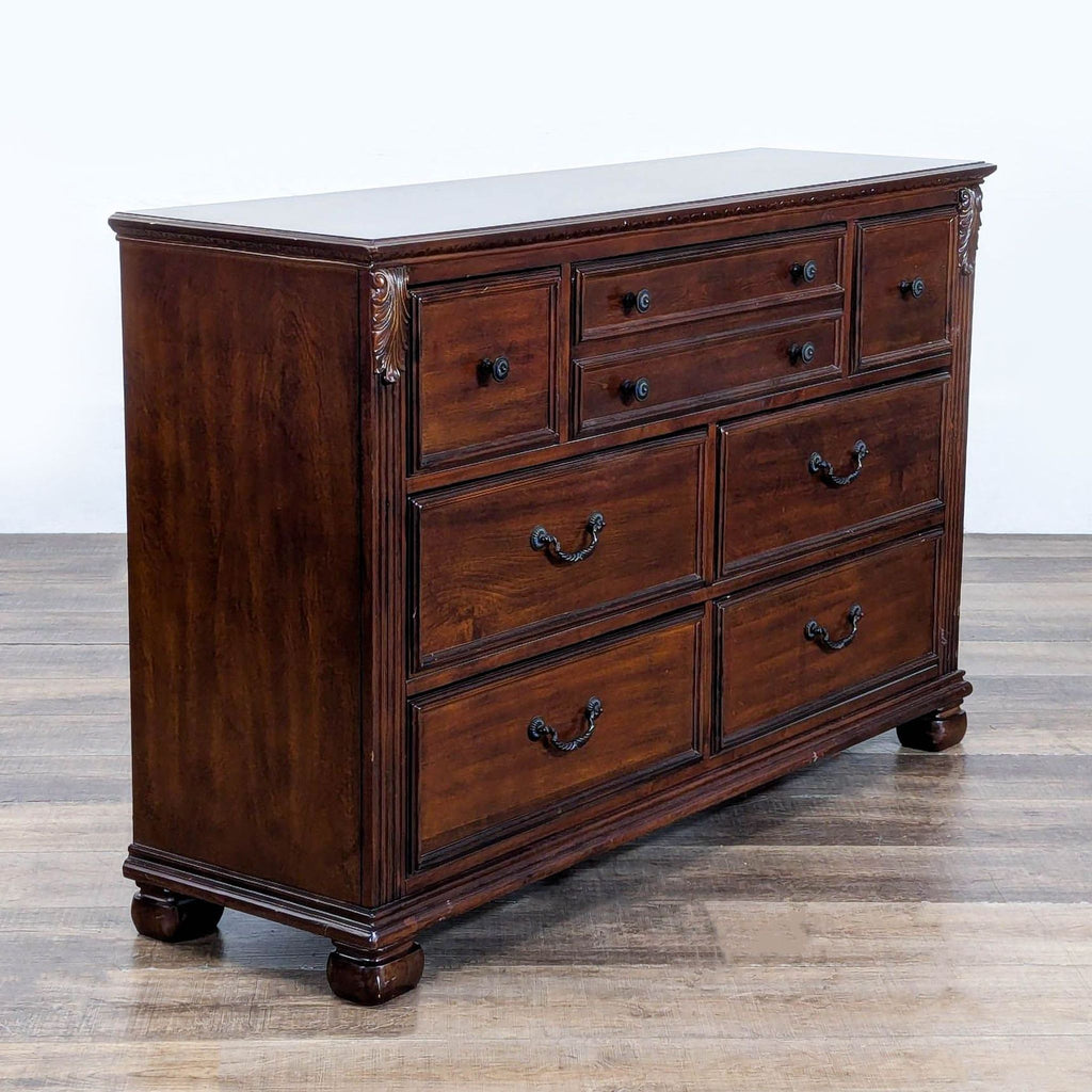 3. Angled view of the Ashley birch veneer dresser, showing classic handles and decorative resin accents.