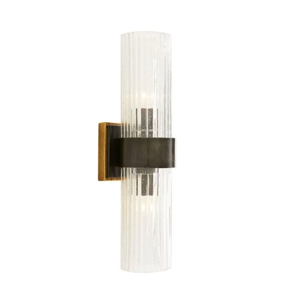 2. Vertical cylindrical wall light by Arteriors, featuring iron detailing and ribbed clear seeded glass shade.