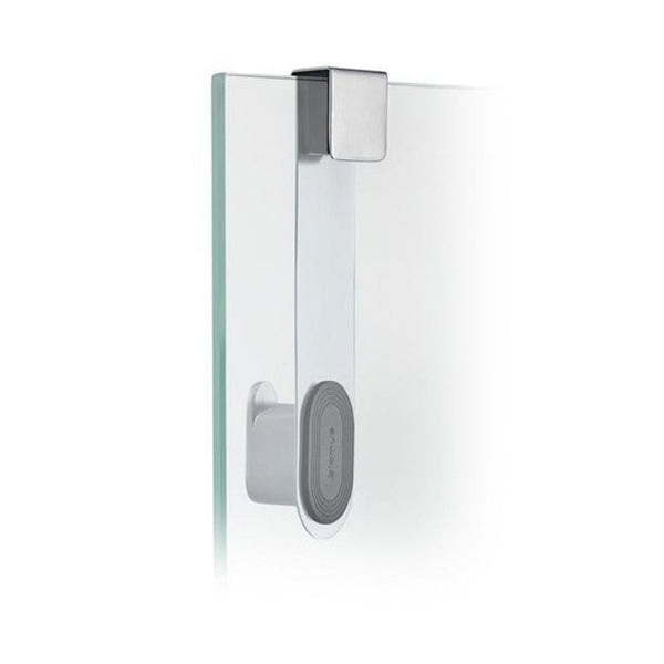 1. Blomus stainless steel hook attached to a glass panel, ideal for hanging items in bathrooms or offices.  