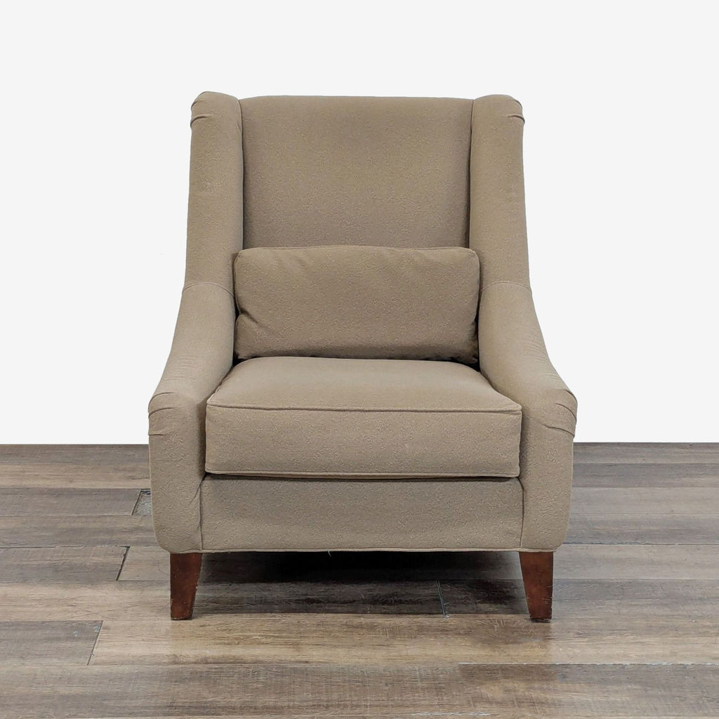 Front view of a taupe lounge chair upholstered in performance wool, by Mitchell Gold + Bob Williams.