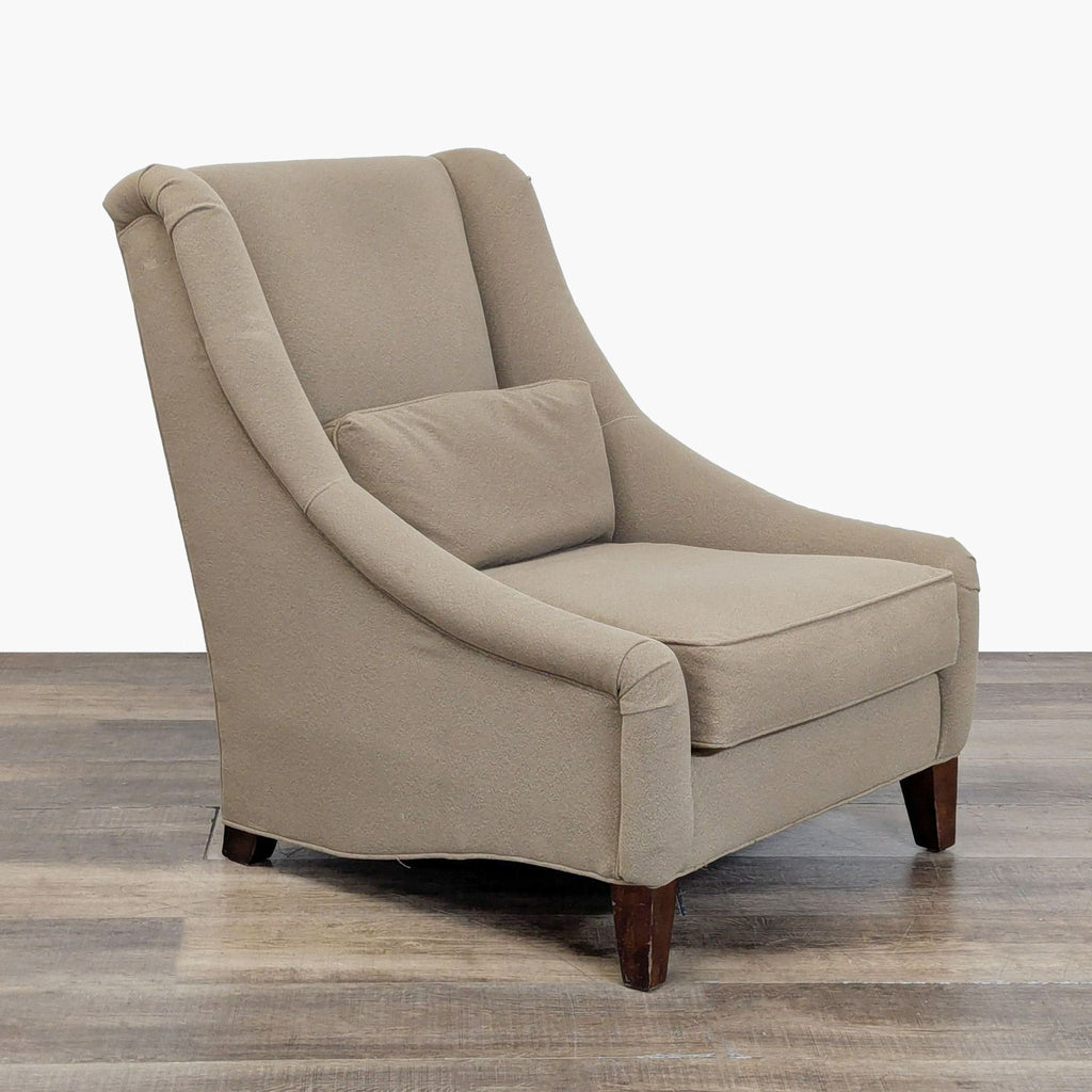Angled side view of a performance wool lounge chair with a cushioned seat, Mitchell Gold + Bob Williams brand.