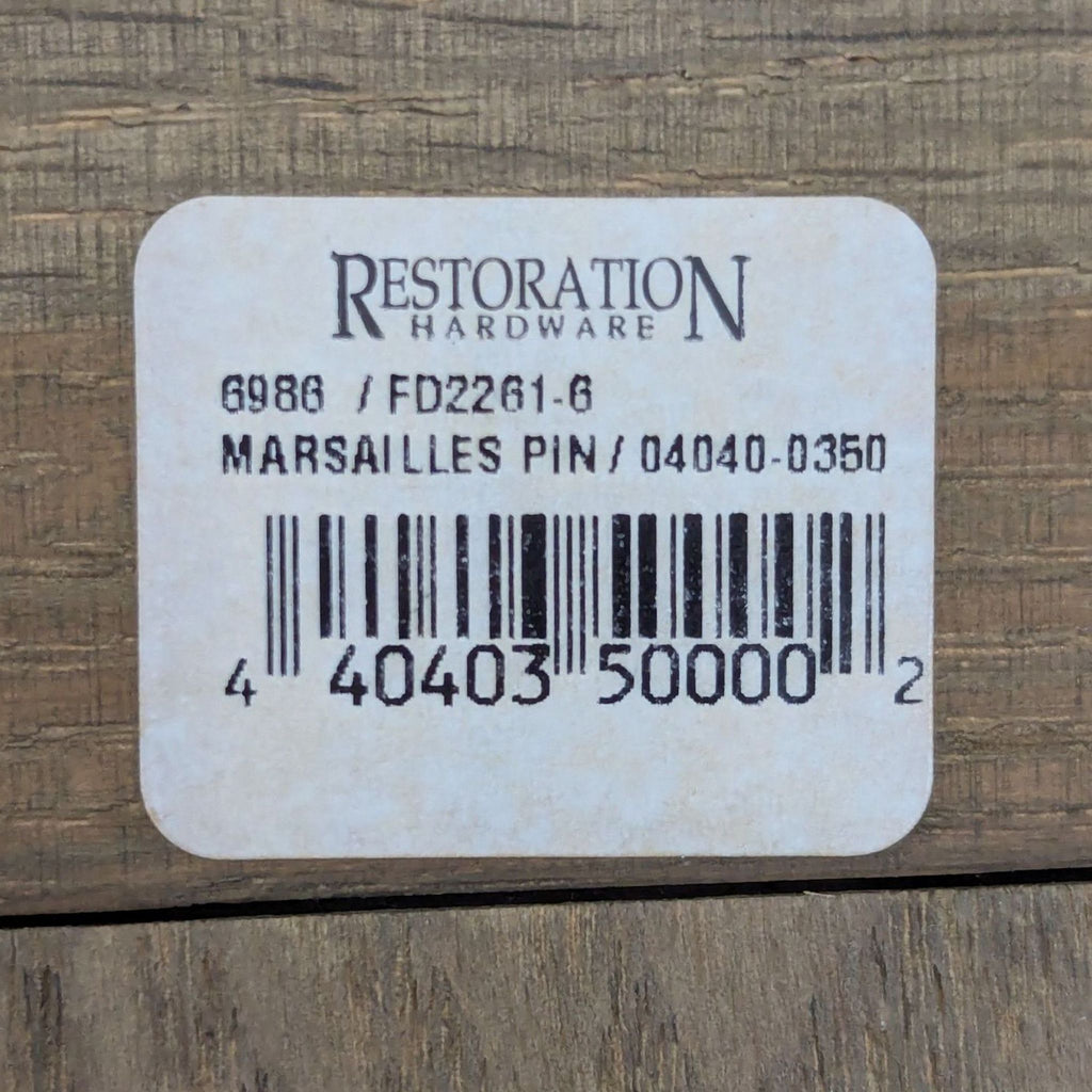 3. Restoration Hardware product label for a board item, with barcode and Marseilles Pin model details.