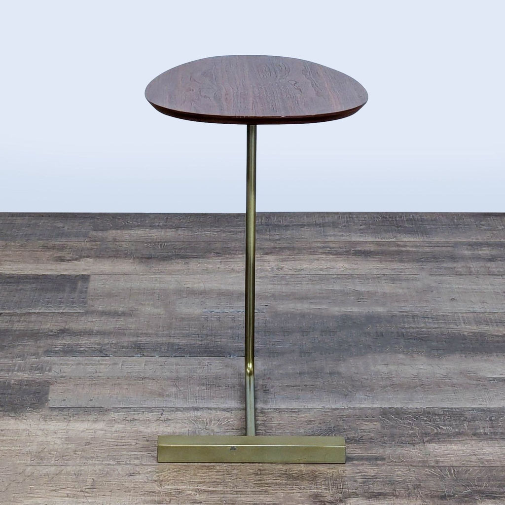 2. Modern West Elm console table featuring an engineered wood walnut top and sleek brass-finished frame.