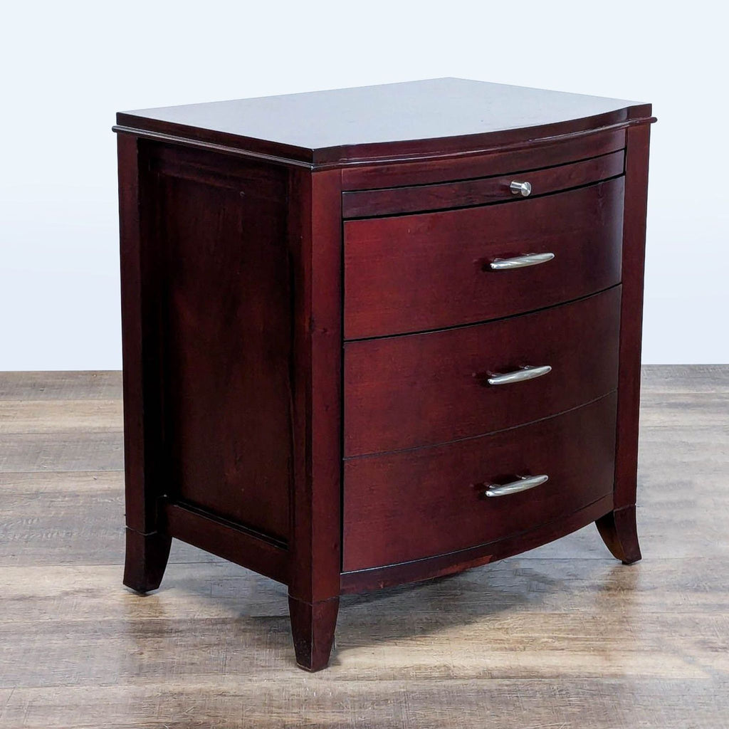 3. Angled view of Modus Furniture nightstand, showing its curved front, rich finish, and fitted metal hardware.