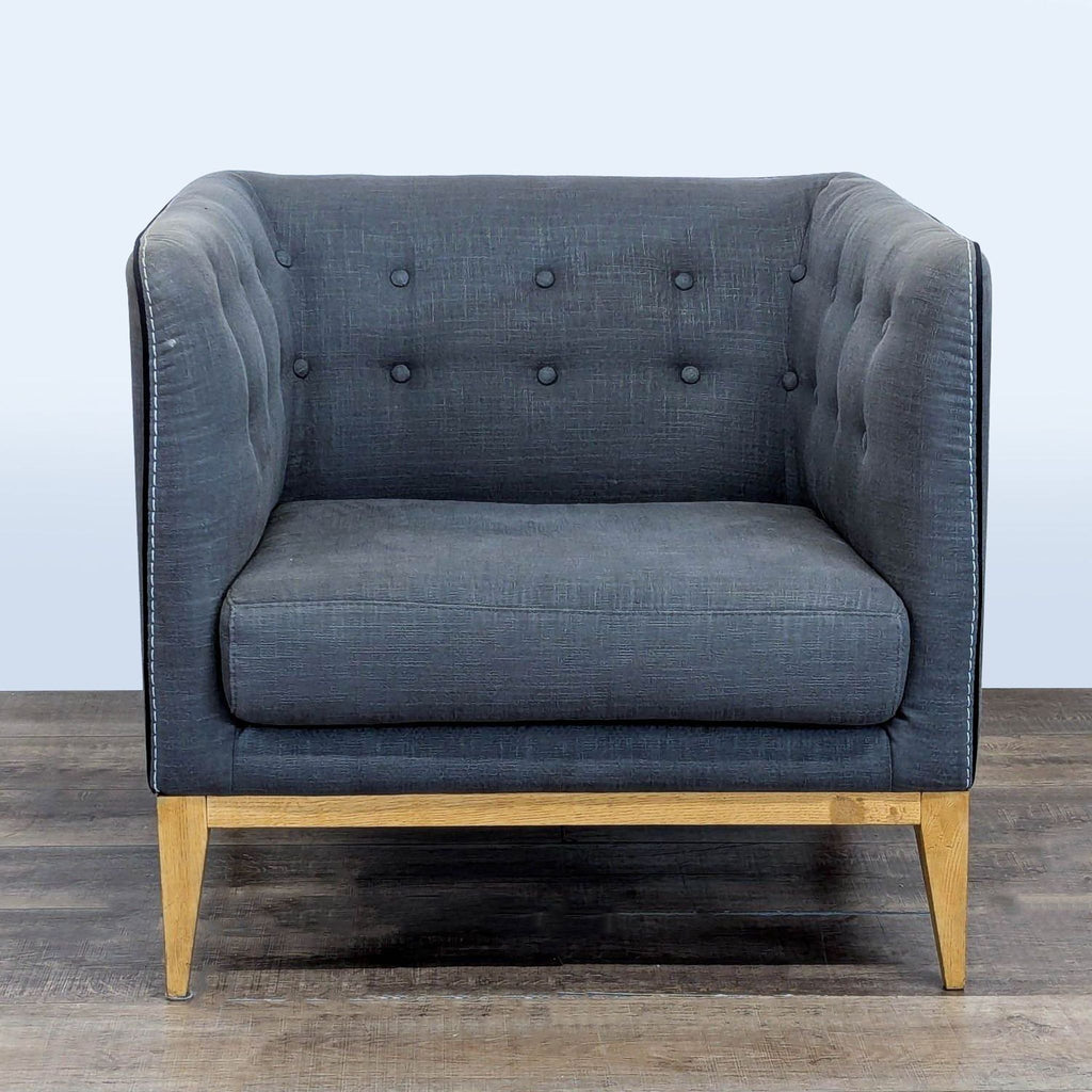 Moe's bench with button-tufted cushion, wooden base, and sturdy legs, shown in a modern setting.