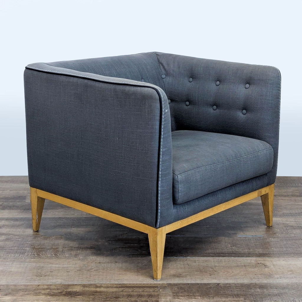 Button-tufted upholstered bench with wooden legs by Moe's; perfect for entryway or living spaces.