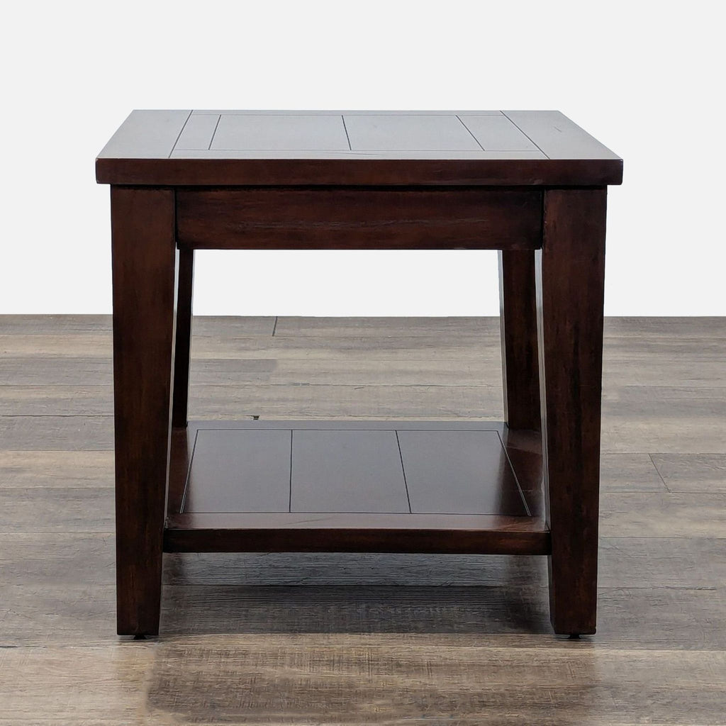 1. Dark wood World Market end table with clean lines and a lower shelf, shown on a wooden floor.