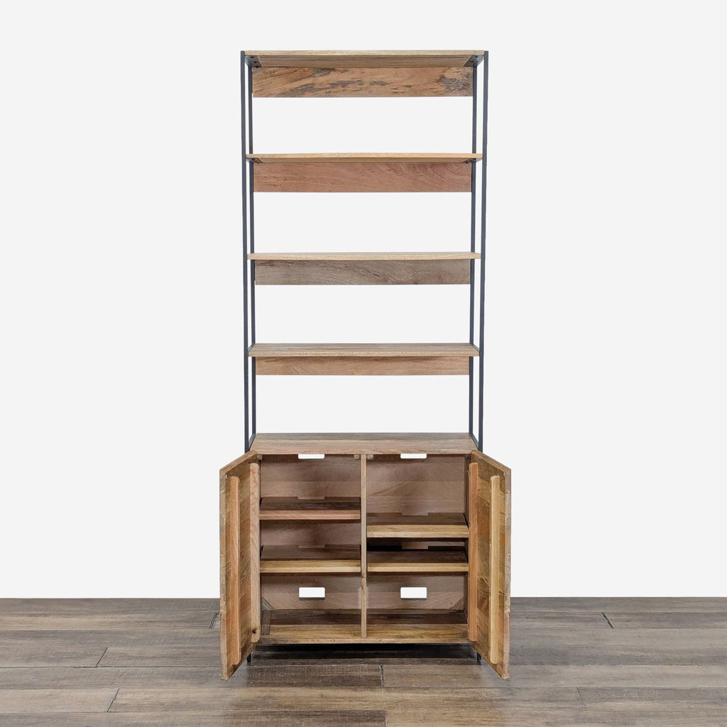 2. Front view of a Williams Sonoma mango wood bookshelf, cabinet doors open to reveal inner shelves.