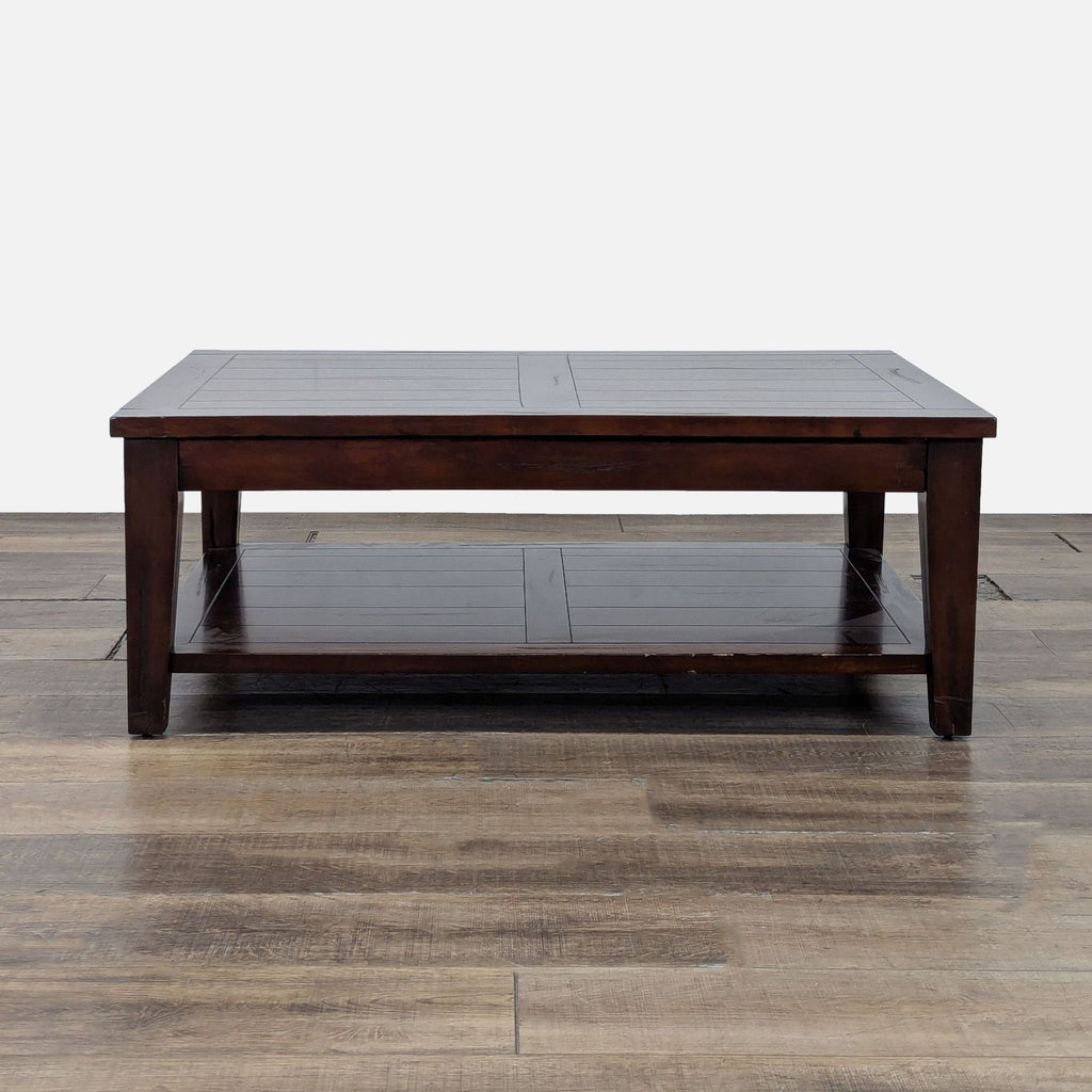 1. Rectangular World Market coffee table with dark wood finish and lower storage shelf, shown on wood flooring.