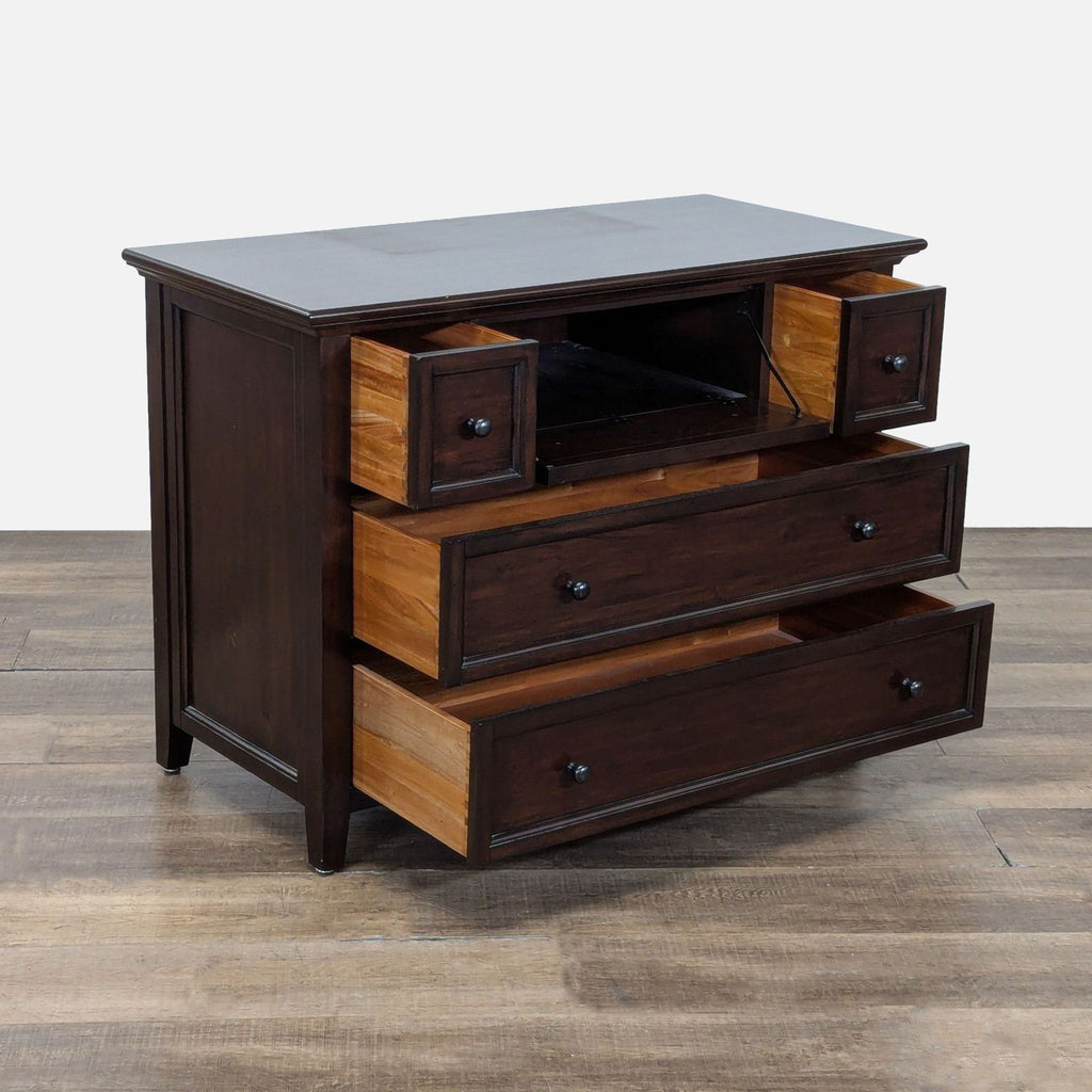 2. Pottery Barn dresser with five drawers, partially opened to reveal interior wood finish.  