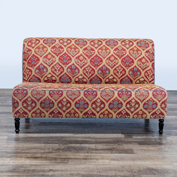 1. Reperch bench with red and gold damask upholstery, curved back, and black spindle legs, front view.