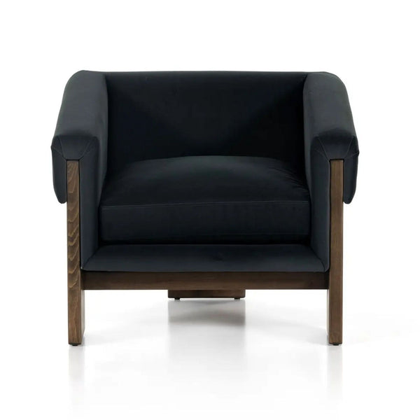 1. Front view of a velvet smoke lounge chair by Havenly, featuring wide plank tripod wood legs and modern design.