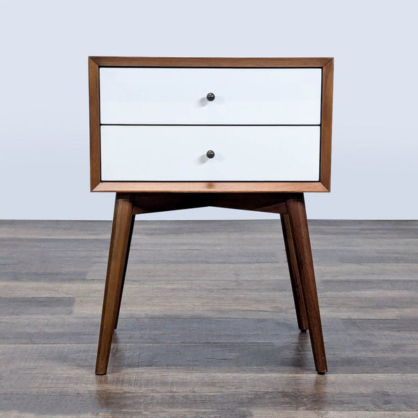 1. Mid-century modern West Elm end table with two white drawers, wooden frame, and angled legs.