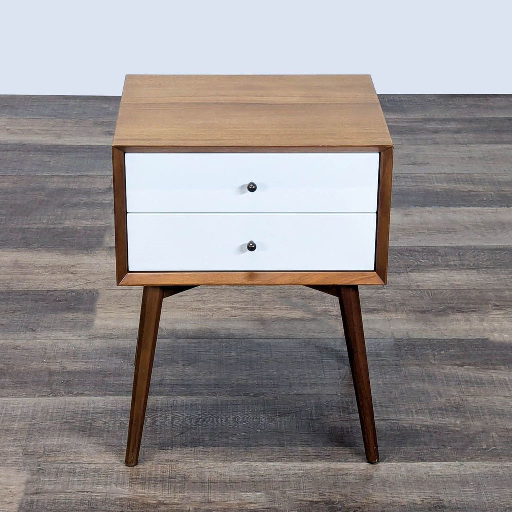 3. Top-down view of West Elm end table with brown wood finish and two front-facing white drawers.