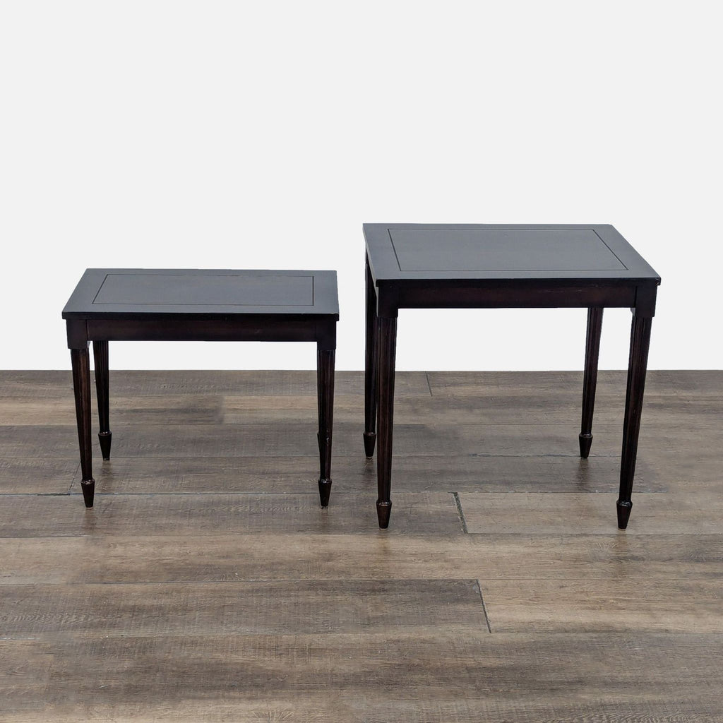 - Two Reperch brand end tables in matching dark finish, placed side by side on a wooden surface.