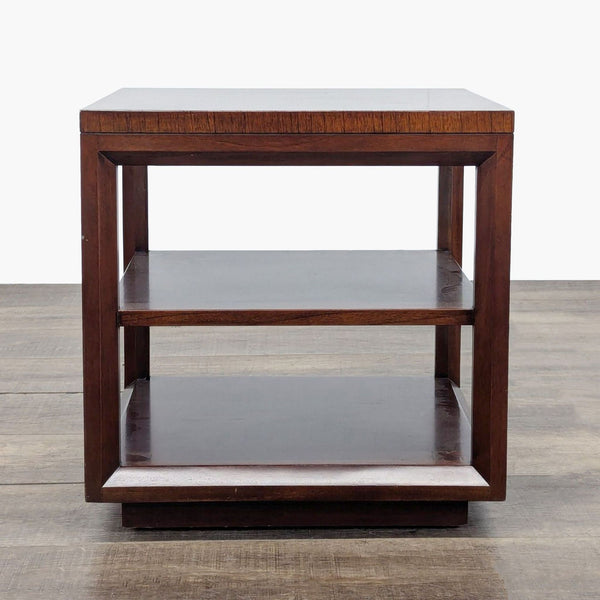 1. Crate & Barrel end table with three wooden shelves, square frame, and a modern open design.