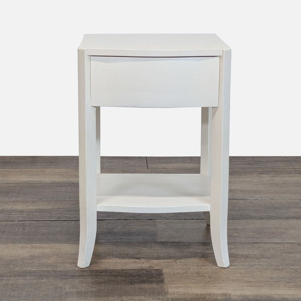 1. West Elm white side table with a drawer and lower shelf, shown on wood floor, front view.  