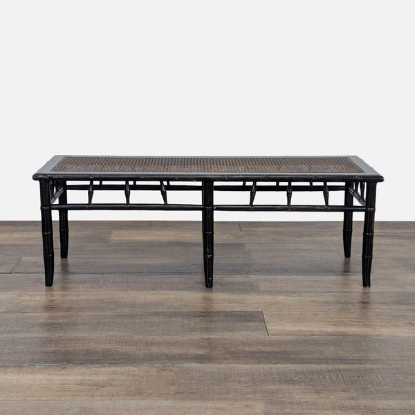 1. Rectangular Reperch bench with black bamboo-style frame and woven rattan seat, shown against a wooden floor.