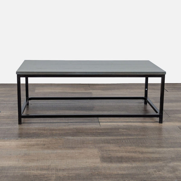 1. Rectangular Reperch coffee table with a metal frame and a wood top, shown on a wooden floor.
