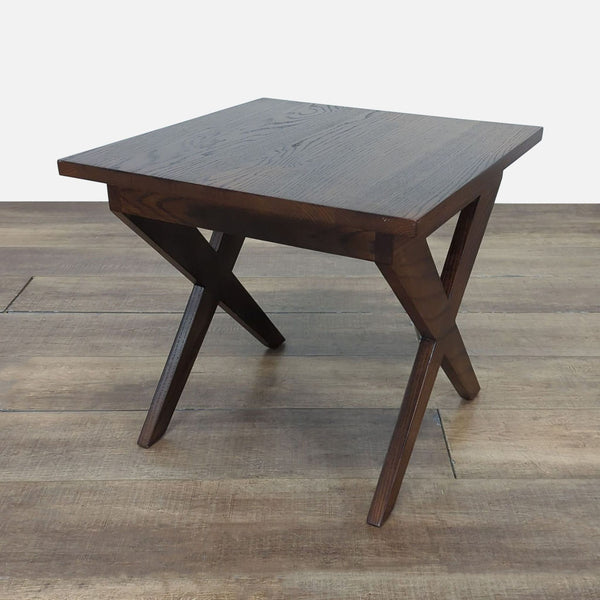 1. Reperch end table with dark wood finish and X-shaped legs, photographed on a wood floor.